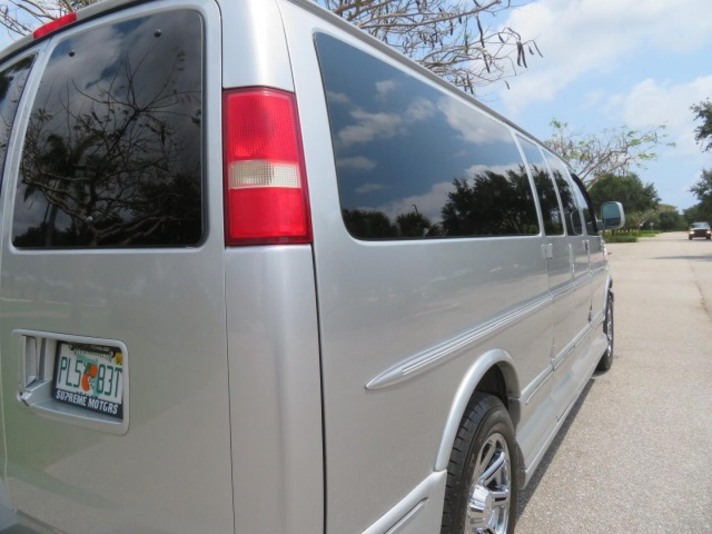 2014 Chevrolet Express (1GBWGLCG3E1) , located at 4301 Oak Circle #19, Boca Raton, FL, 33431, (954) 561-2499, 26.388861, -80.084038 - You are looking at a Rare 2014 Chevy Express 2500 Quigley 4x4 Four Wheel Drive Explorer Limited SE 9 Passenger Conversion Van with: 107K Original Miles, 6 Captain Chairs, Rear Power Folding Bench Seat Bed, Center Consoler Cooler, Front PPF (Paint Protection Film) Explorer Limited Conversion Througho - Photo#44